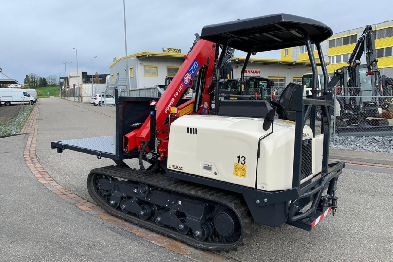 YANMAR Raupendumper C30-3 mit Kran HMF 270 von links